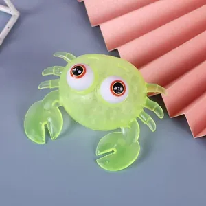Detailed view of translucent lime green TPR crab stress relief toy with cute big eyes