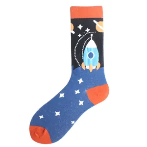 Detail shot of novelty men's space socks featuring rocket and planet printed patterns