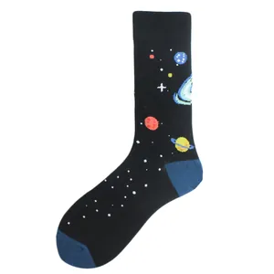 Detailed view of black crew socks featuring colorful outer space planet patterns.