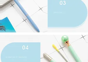Detailed close-up of a textured light blue metal ballpoint pen with replaceable refill.