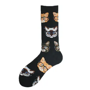 Detailed view of black mid-calf socks featuring fun patterns of cats wearing glasses