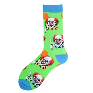 Detailed view of green crew socks featuring a horror clown pattern with balloons.