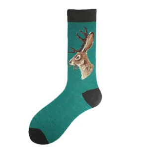 Close-up detail of trendy green mid-calf sock featuring creative jackalope embroidery.