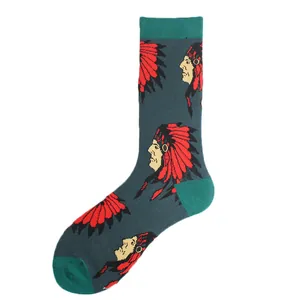 Detail view of crew socks featuring a repeated Native American chief pattern in red and grey