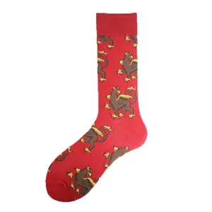 Detailed view of red crew socks featuring a distinctive golden griffin heraldic pattern.