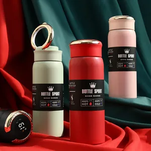 Close-up of three colorful 304 stainless steel thermos bottles with temperature display