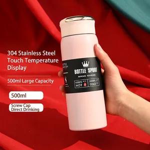 Close-up of a 500ml pink stainless steel insulated bottle with temperature display