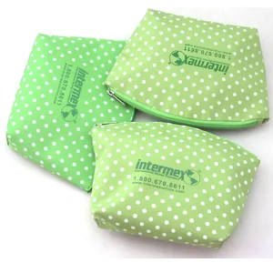 Set de tres neceseres de cosméticos de cuero PU verde con lunares y cremallera.