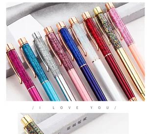 Detailed view of colorful glitter ballpoint pens with oil-infused hourglass design.