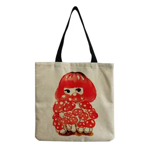Close-up view of a cute mushroom girl cartoon print on a natural linen canvas tote bag