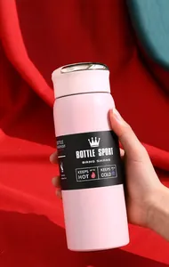 Detail of a matte pink vacuum thermos flask showing its premium textured finish.
