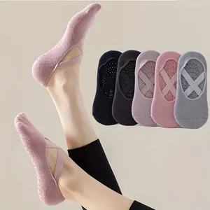 Non-slip cotton yoga socks with cross straps for Pilates and indoor fitness exercises