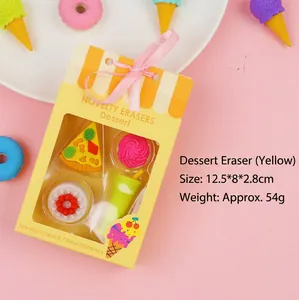 Detalle de gomas de borrar temáticas de postres en caja de regalo amarilla con cinta