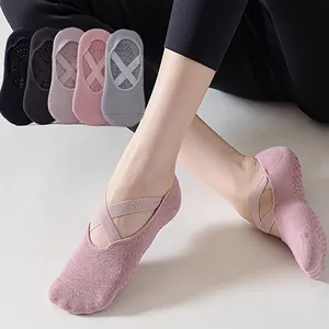 Non-slip yoga socks with cross straps for Pilates and indoor fitness in multiple colors