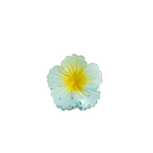 Elegant gradient egg flower hair claw clip for summer hair styling on white background