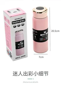 Detailed view of pink 304 stainless steel vacuum insulated cup with retail packaging