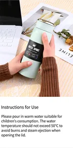 Close-up detail of a mint green 304 stainless steel vacuum insulated water bottle
