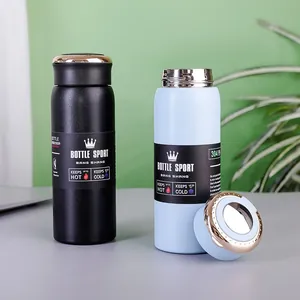 Detail of 304 stainless steel insulated bottles in black and light blue with ring lids