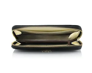 Interior detail view of black long PU leather wallet with multiple card slots and zip pocket.