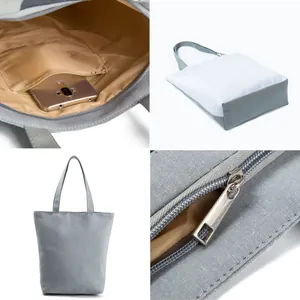 Versatile grey and white canvas tote bag with inner pocket and zipper detail