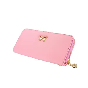 Elegante cartera larga de cuero PU rosa para mujer con lazo dorado y cierre de cremallera