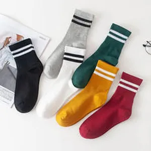Detailed view of multi-colored striped cotton crew socks for sports and casual street wear