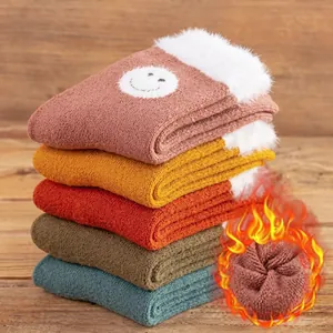 Detailed close-up showing thick white fleece lining and colorful stacked winter socks.