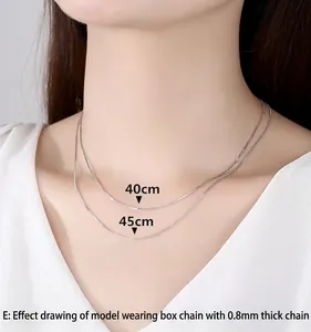 Comparison of 40cm and 45cm fine silver box chain necklaces on model, 0.8mm width