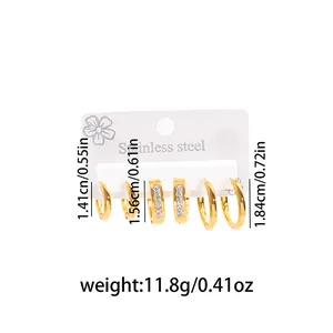 Detailed view of three sizes gold-plated stainless steel hoop earrings set with weight
