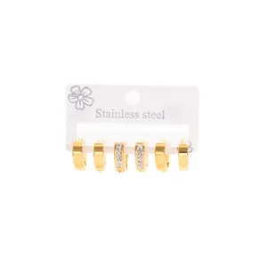 Three pairs set of gold-plated stainless steel hoop earrings with sparkling crystals.