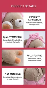 Detailed view of cute plush bear keychain with soft pink headband and metal ring.