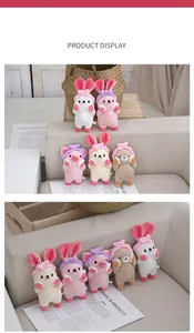 Detailed view of various cute plush animal charms including rabbit, pig and bear designs