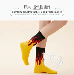 Macro view of Demon Slayer inspired flame pattern socks showing breathable cotton.
