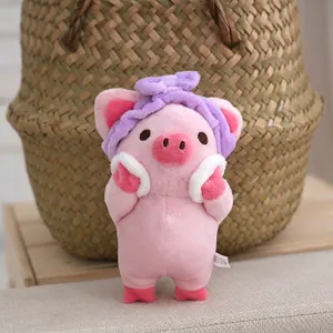 Adorable cute pink plush pig keychain with purple headband and soft skin-friendly texture