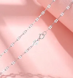 Macro view of S925 sterling silver four-leaf clover chain necklace with Italy stamp