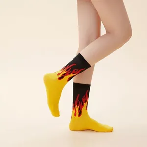Unisex cotton mid-calf socks featuring a bold yellow and black flame streetwear design.