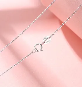 Detailed macro view of S925 sterling silver O-chain necklace clasp with Italy stamp
