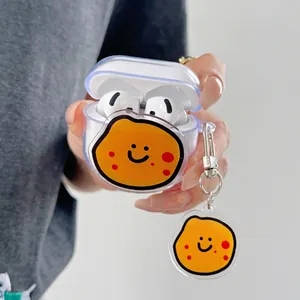 Cute transparent Airpods case with yellow vegetable smiley face and matching charm