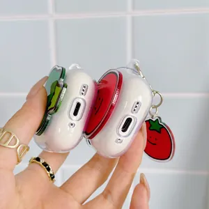 Close-up detail of cute tomato and avocado themed clear protective cases for Apple AirPods