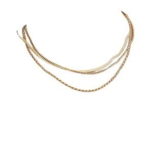 Elegant gold layered necklace featuring flat snake and rope chains for women's fashion