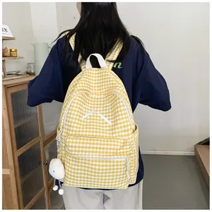 Yellow and white gingham school backpack with cute bow and plush charm decoration