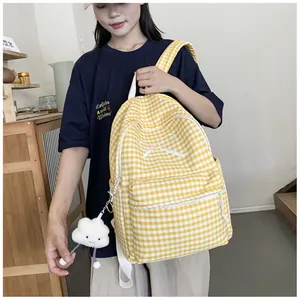 Yellow and white gingham backpack with bow embroidery and cloud plush keychain