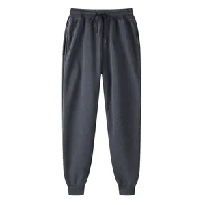 Dark grey fleece jogger sweatpants with drawstring elastic waist and side pockets