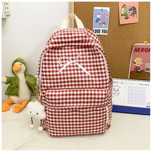 Red and white checkered school backpack with white bow embroidery and cloud charm