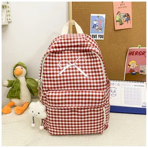 Cute Japanese style red gingham school backpack with white bow and cloud plush charm