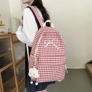 Japanese style red gingham backpack with white bow and cloud keychain for students