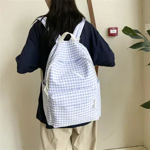 Japanese style purple gingham backpack with bow for high school girls back view photo
