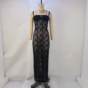 Sexy sheer black lace maxi evening dress with slim fit design shown on a mannequin.