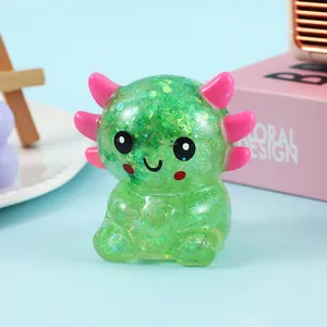 Adorable green glitter axolotl squishy stress toy for sensory play and relief