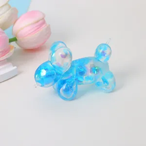 Close-up detail of a blue translucent balloon dog squeeze toy filled with colorful glitters